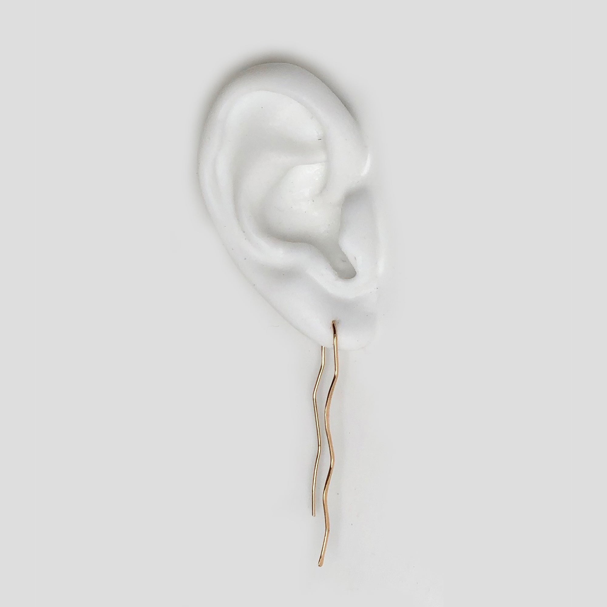 Buttress Hook from our Callen Thompson collab, these lightweight earrings are hand-formed and hammered from 14k gold wire.
