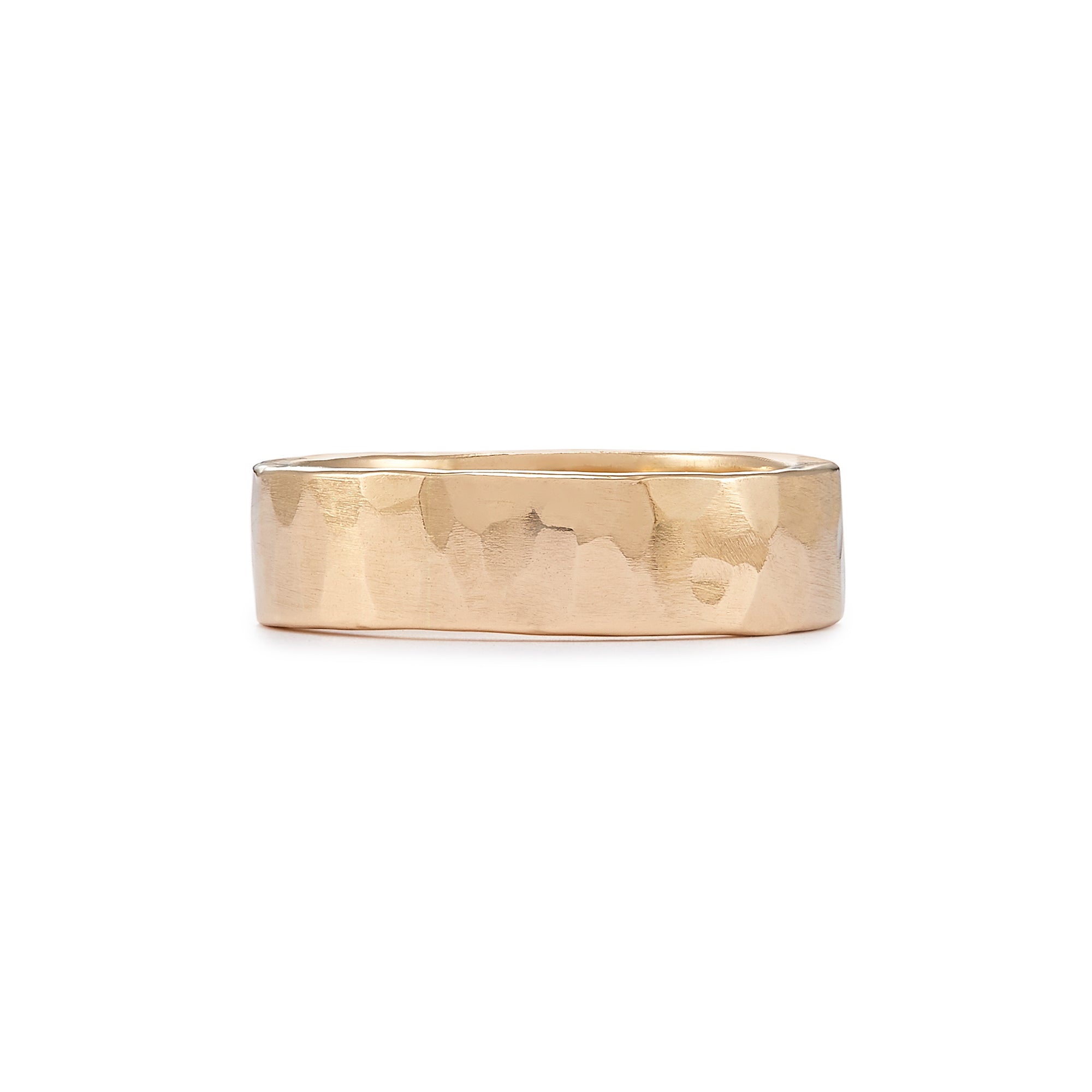 The 6mm Classic Band in 14k gold is a timeless ring featuring a lovely hammered texture with a soft matte finish 