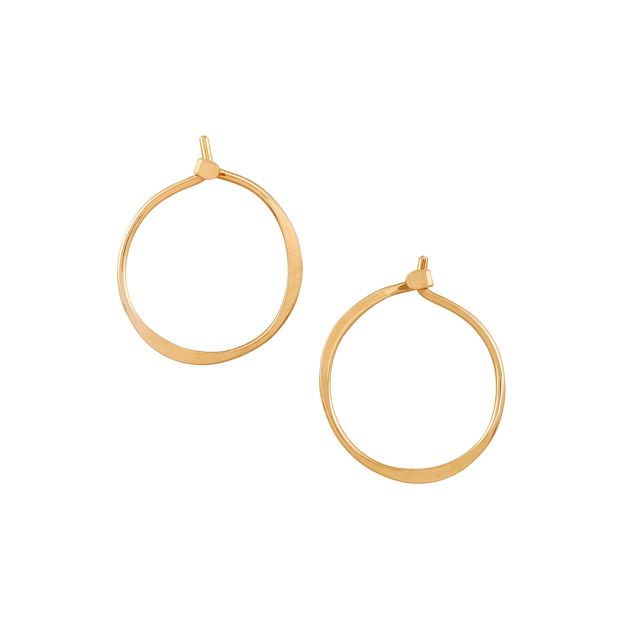 Classic Round Hoops in 14k gold, featuring an organic, hammered texture and quality craftsmanship.