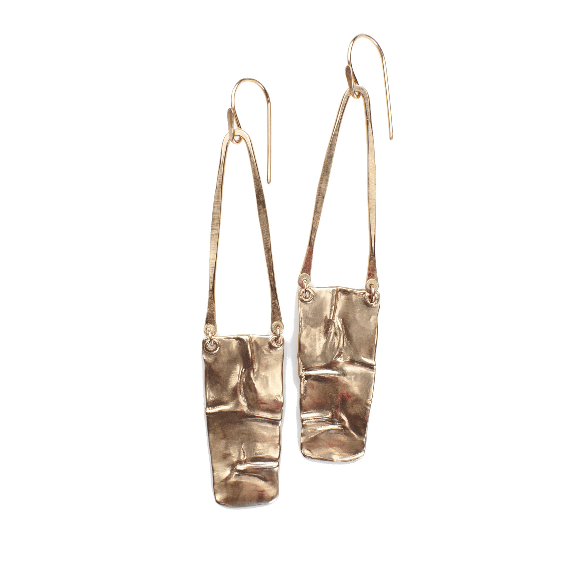 The Shoal Earrings definitely make a statement with an organic pendant suspended on forged 14k gold wire.