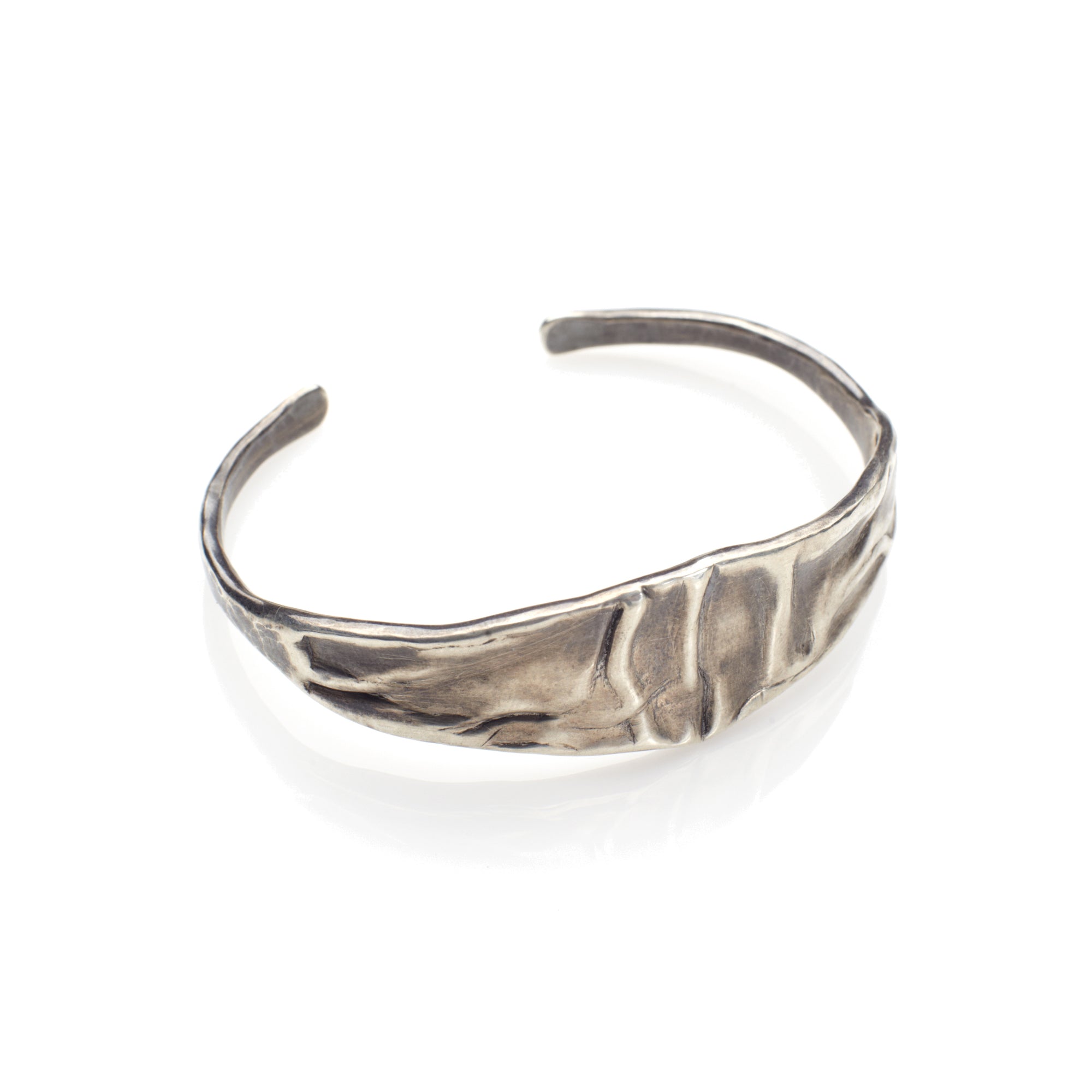 The Shoal Cuff is a bold organic cuff bracelet in oxidized sterling silver.