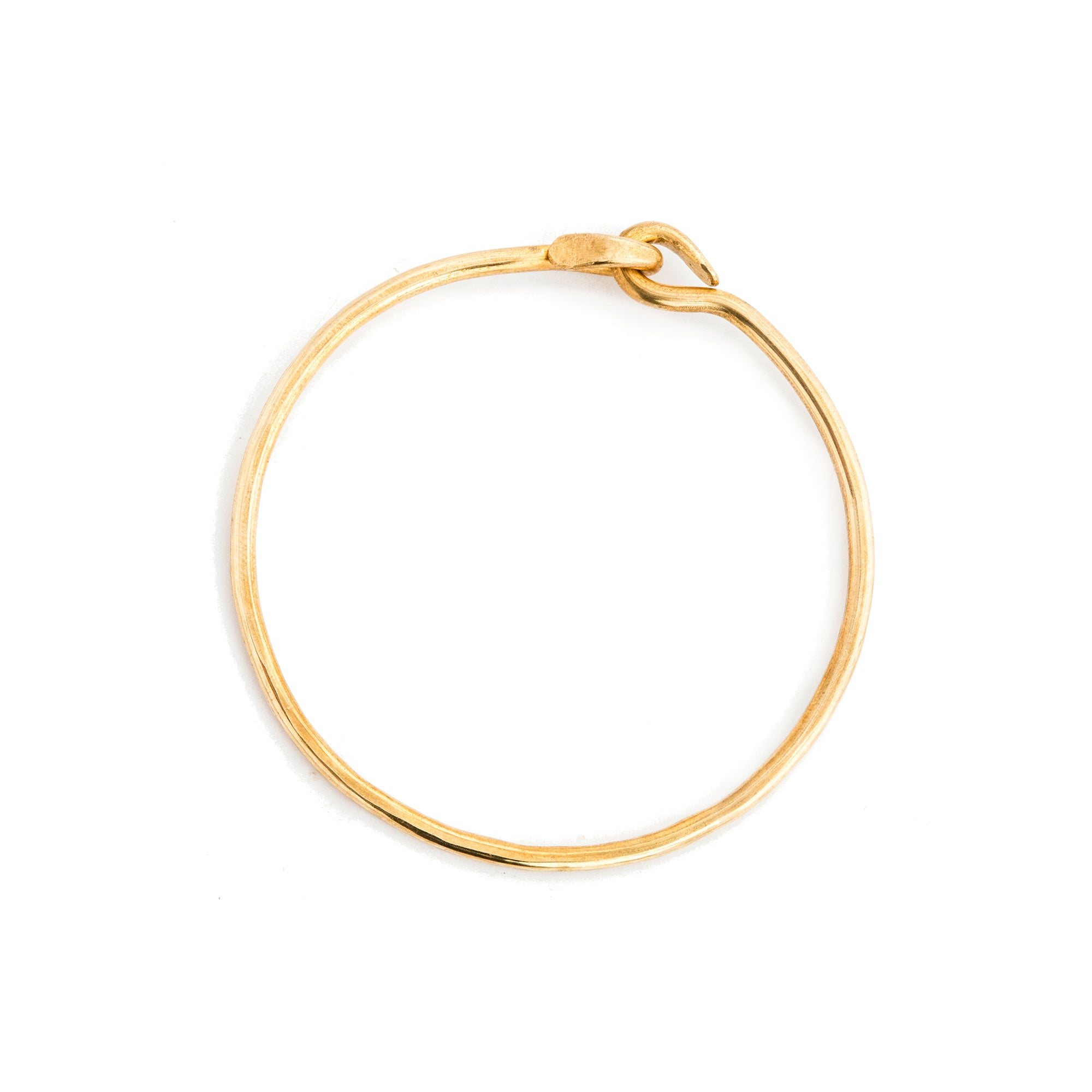 Thick and rustic, our Utilitarian bangle is hand-forged and hammered for a subtle texture