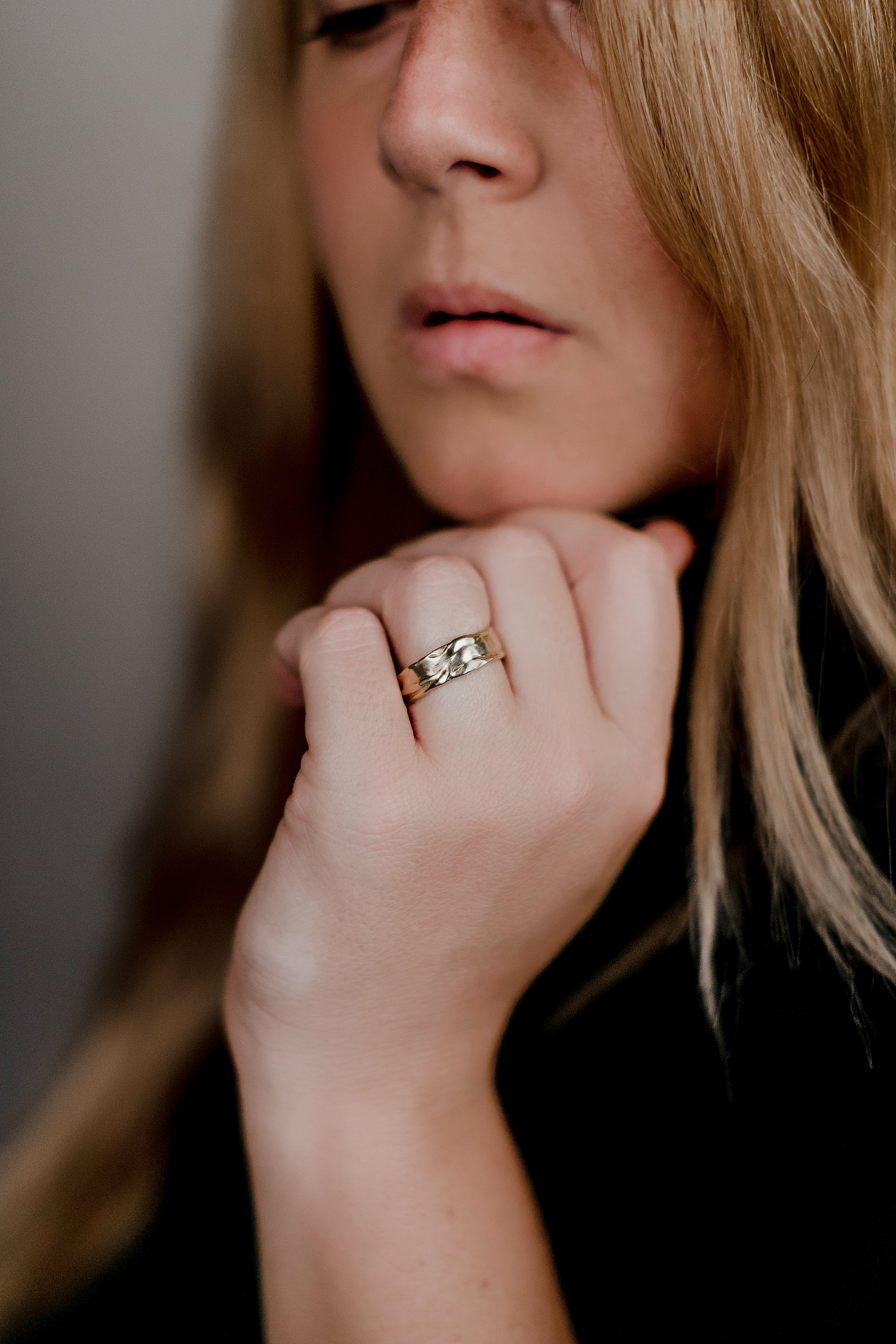 The striking Drift Band is a beautifully textured modern ring in 14k yellow gold creating a lightweight and organic band.
