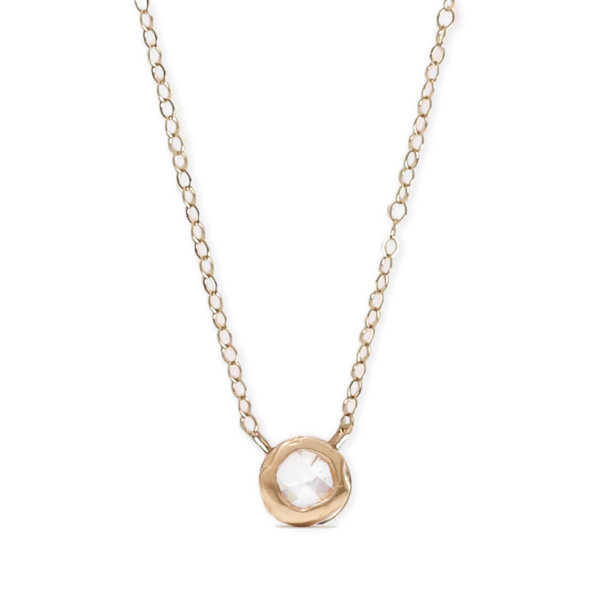 The Atol Diamond Necklace is simple and stunning, featuring a 3.4mm rose cut diamond flush set in a 14k gold pendant.