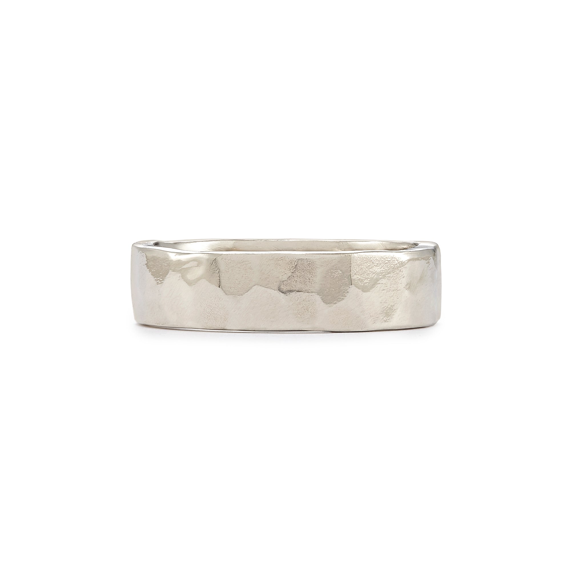 The 6mm Classic Band in 14k gold is a timeless ring featuring a lovely hammered texture with a soft matte finish 