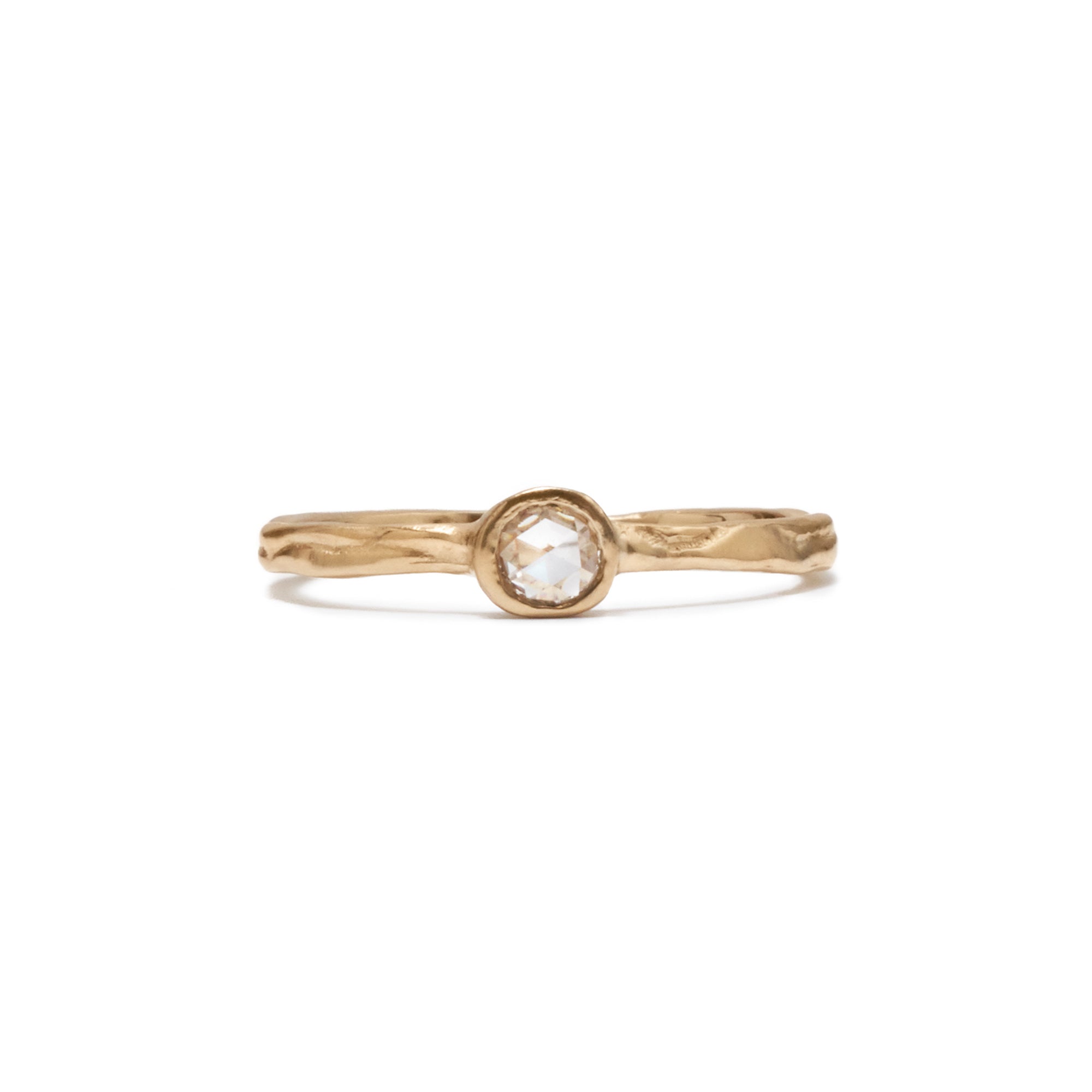 The Cusp diamond solitaire in 14k gold is the perfect way to commemorate an engagement or special occasion. 