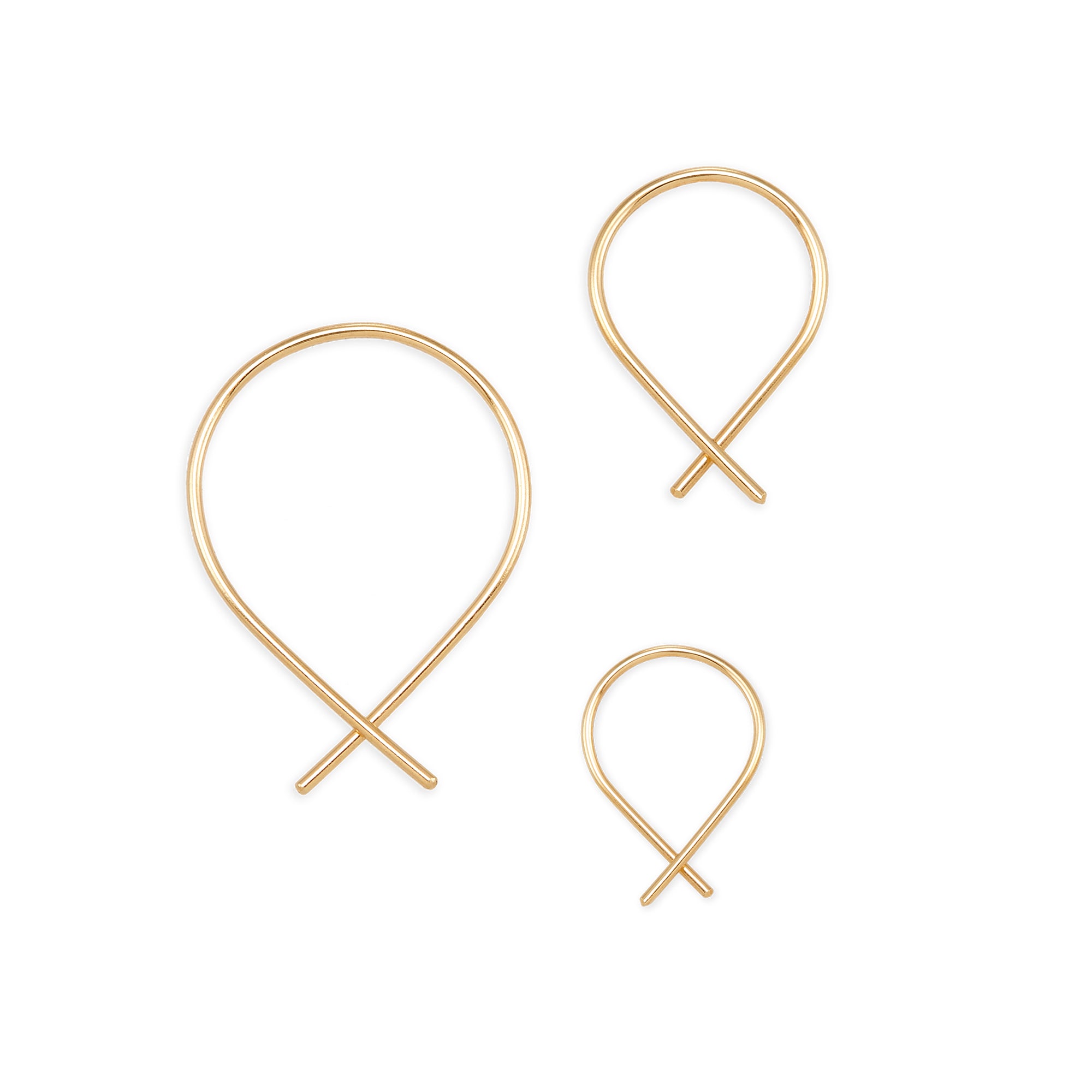 With their casual vibe and unique design, our 14k gold Goldfish Earrings are the perfect modern alternative to the hoop.