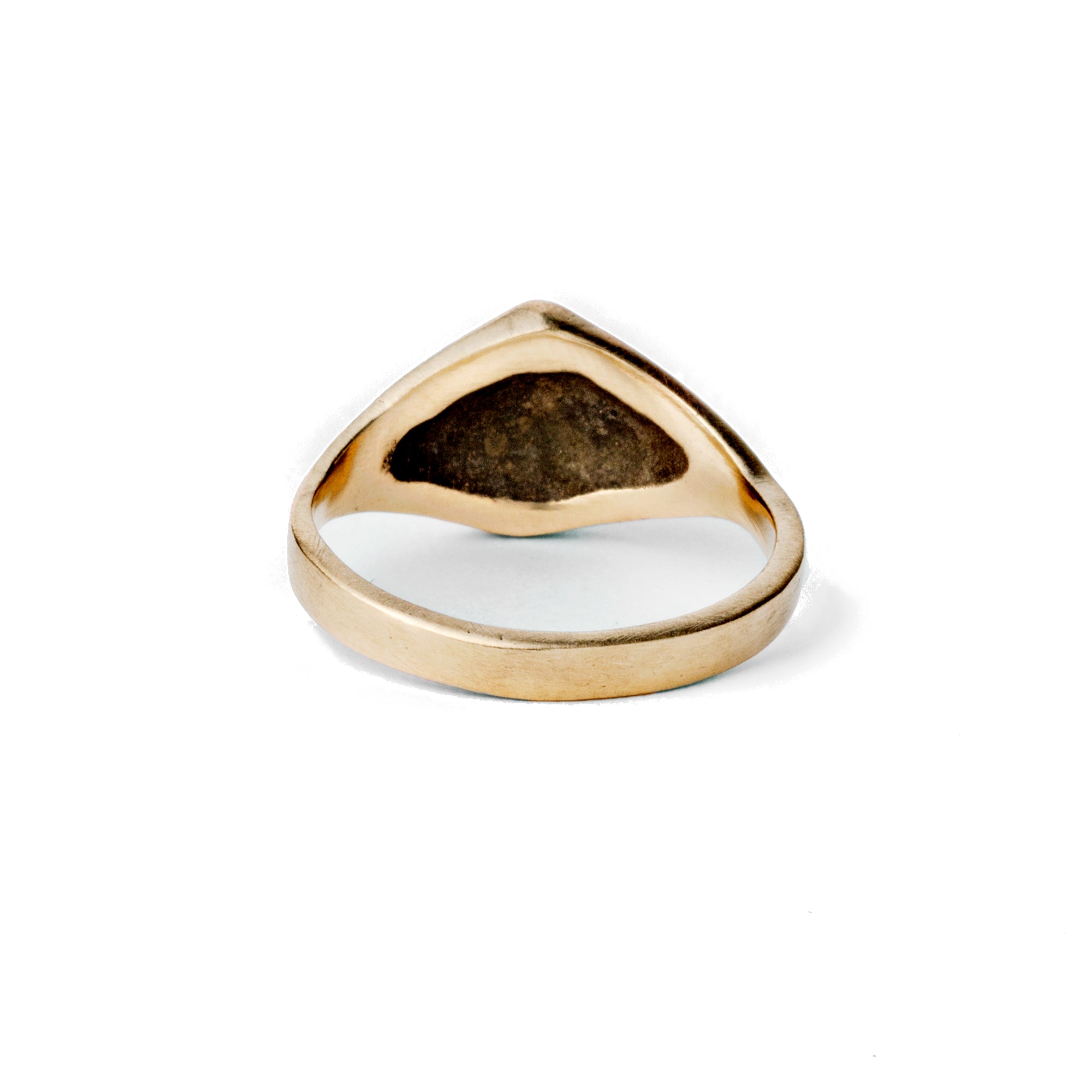 The Graphite Ridge Ring is a 14k gold sleek signet ring with a flat brushed finish and ridge running down the center.
