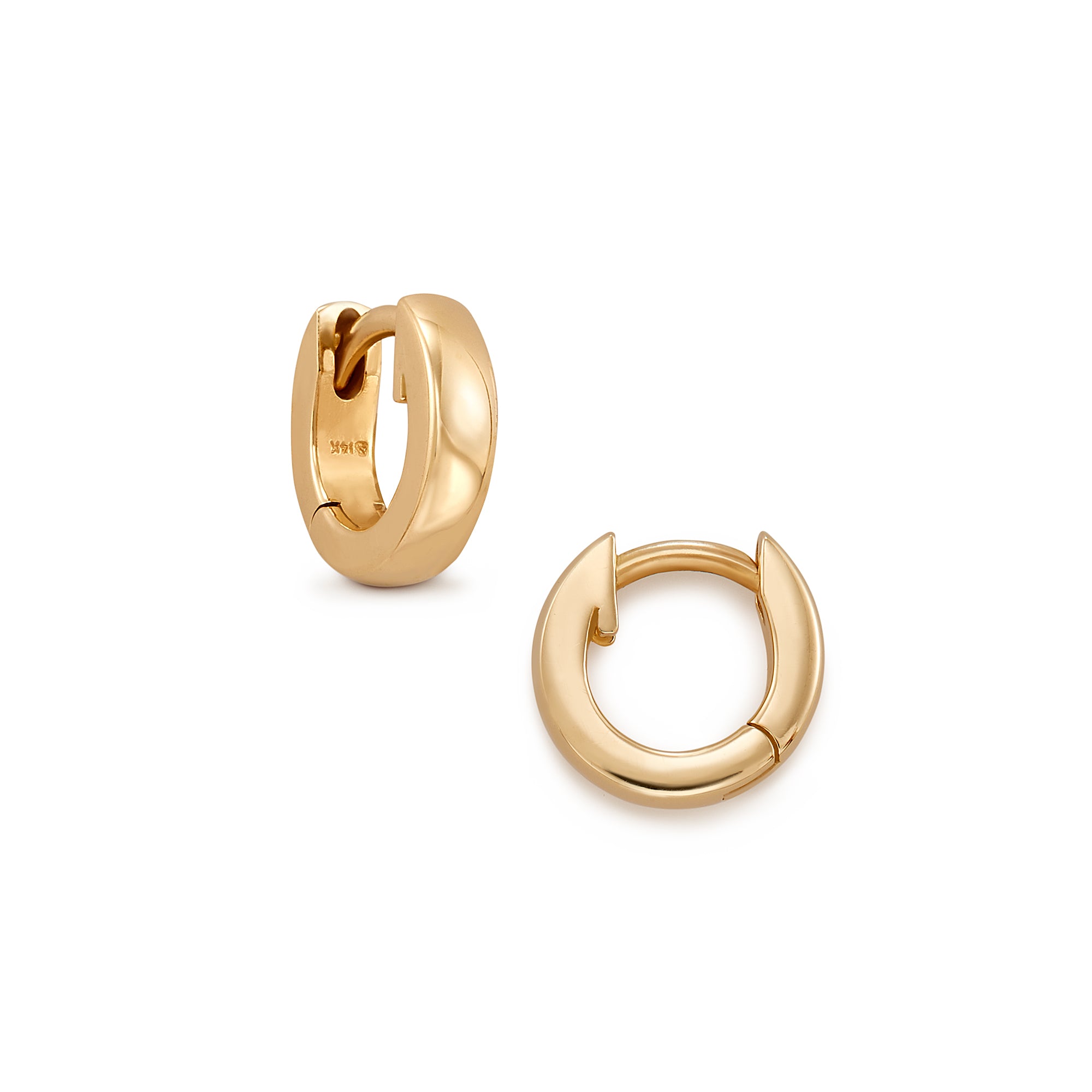 The Chubby Hinged Hoop hugs your earlobe while giving you something to notice. This chunky modern hoop is made from 14k gold