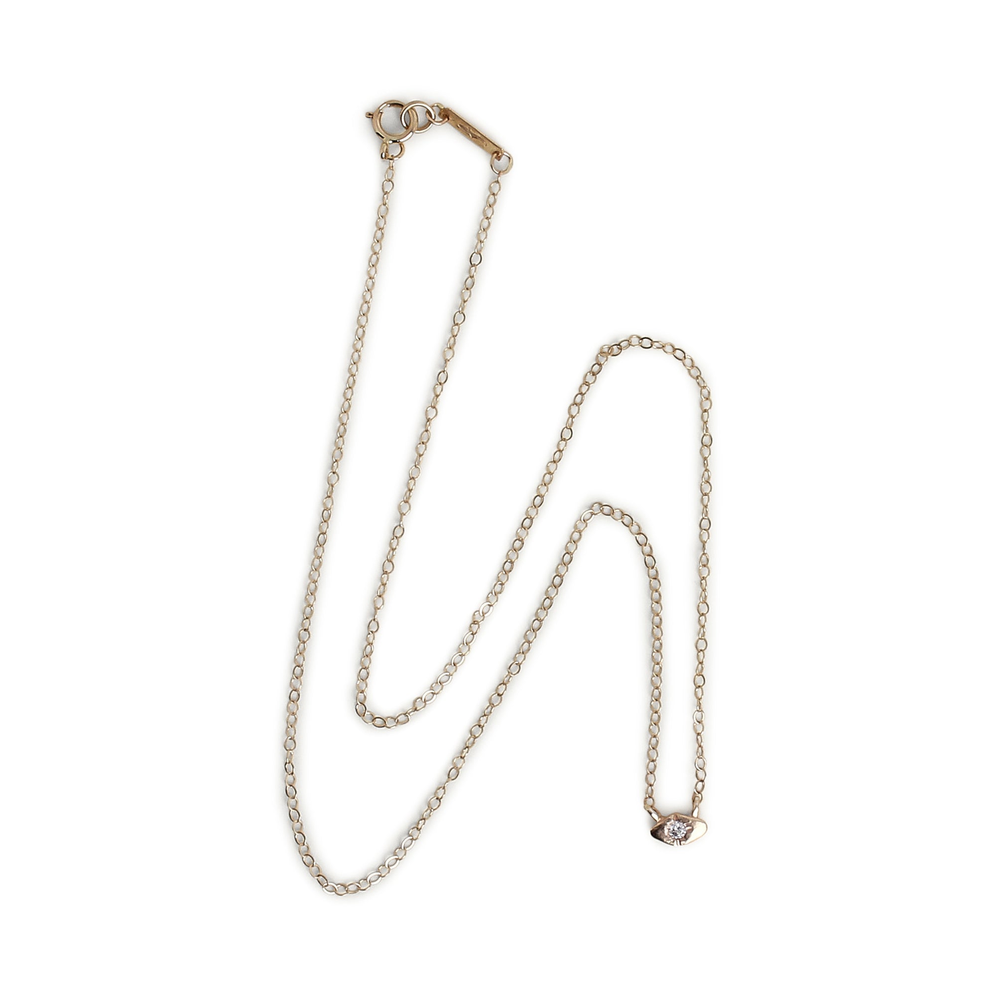 The delicate Slope Necklace is perfect for everyday wear with a single 0.04 tcw diamond flush set in 14K gold.