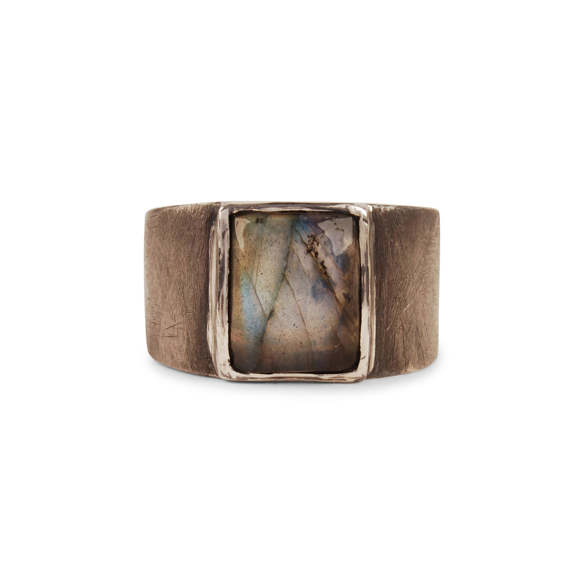 The Grit Rectangle Ring features a rectangular bezel set cabochon stone in your choice of labradorite or lapis