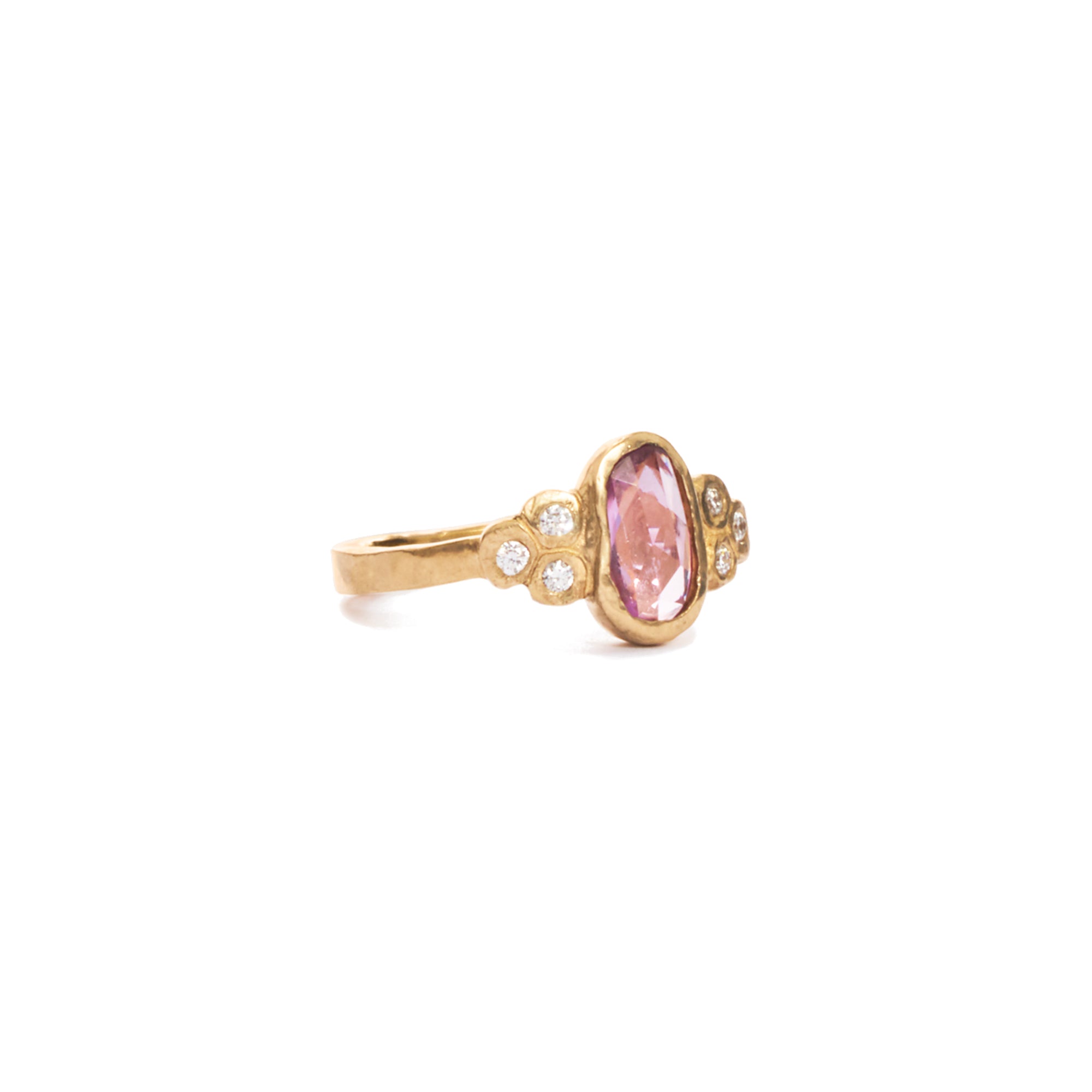 This unique ONE-OF-A-KIND pink sapphire solitaire makes a wonderful engagement ring for the alternative bride.