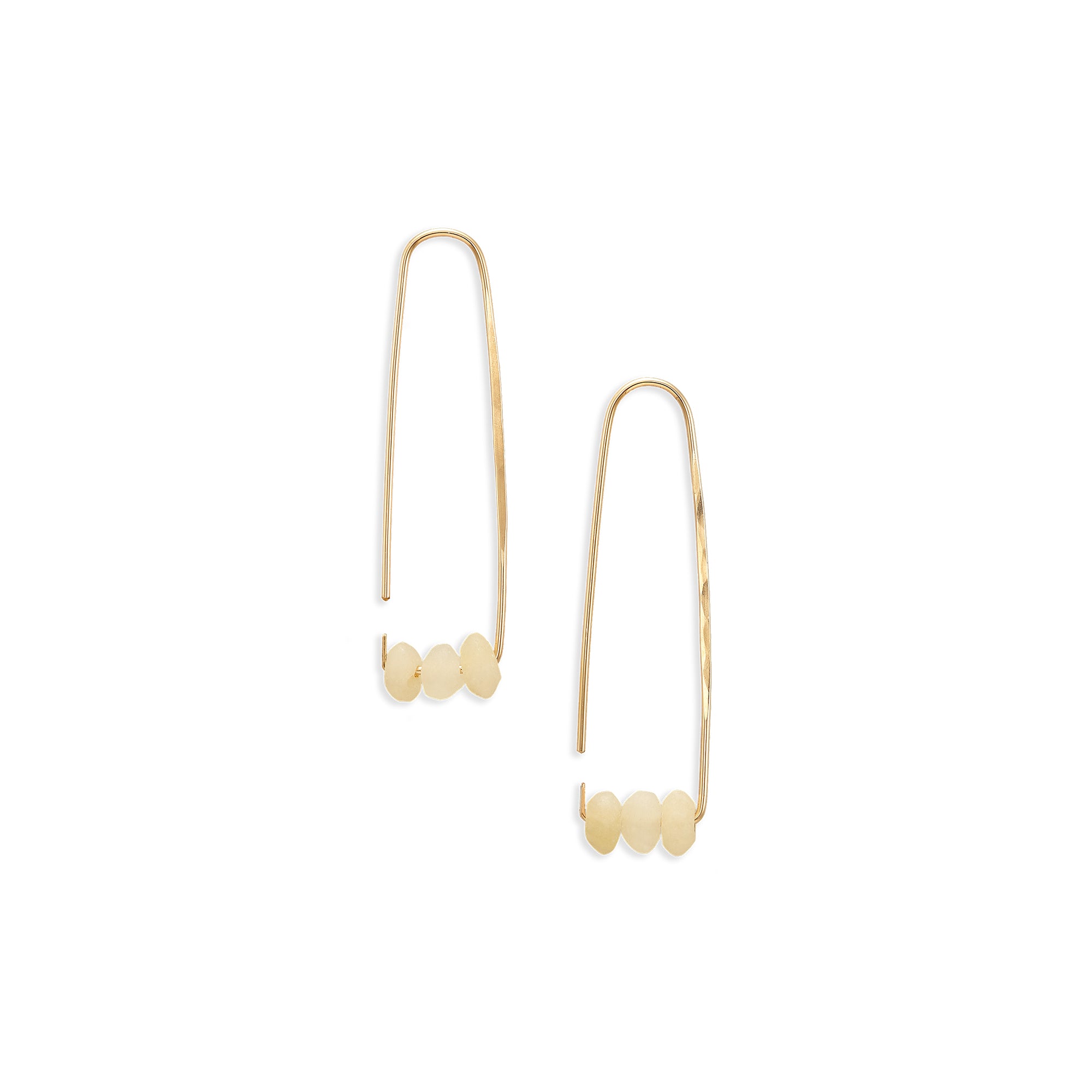 The Elongated Aura Hoops are made of 14k yellow gold fill or sterling silver and adorned with your choice of beads.