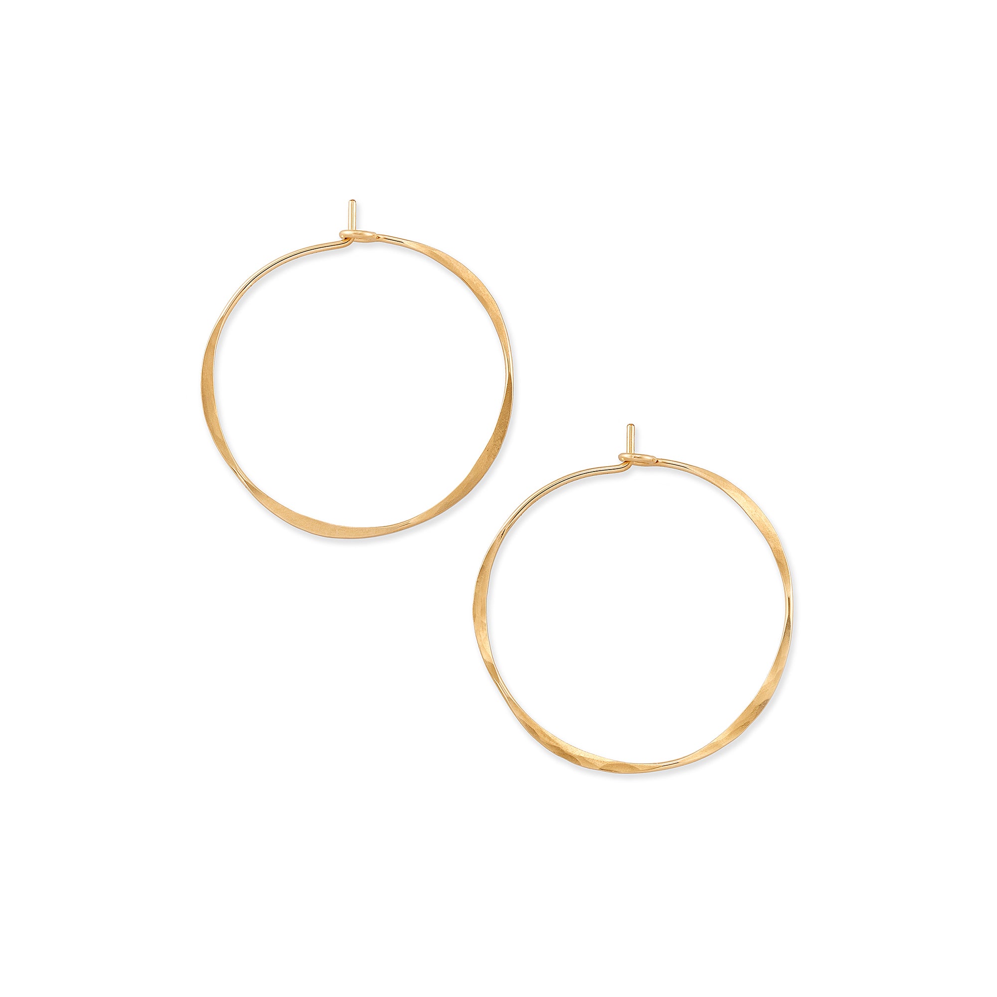 Bold and versatile, our classic hammered hoops are the perfect statement-making pair to add to a modern, casual collection