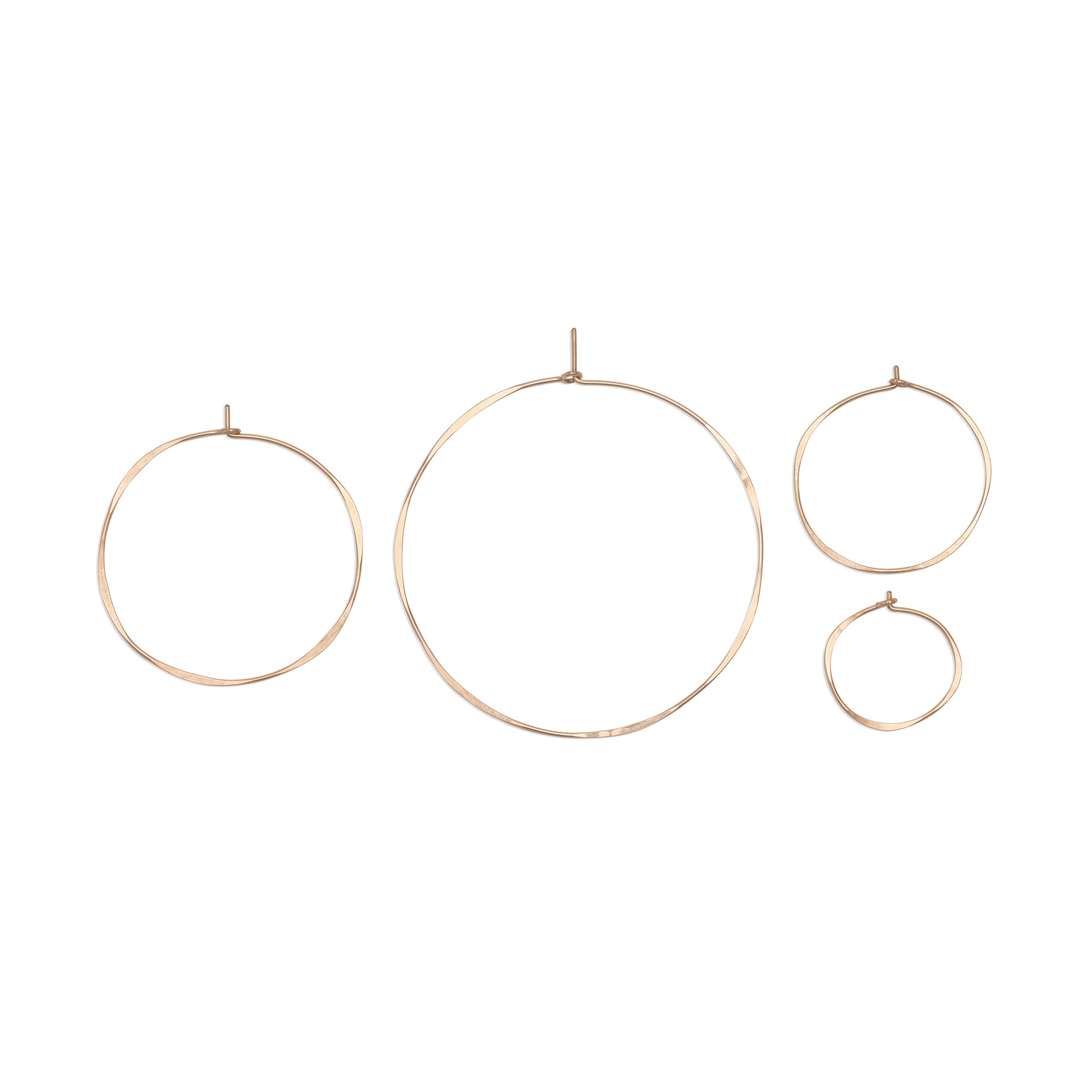 Bold and versatile, our classic hammered hoops are the perfect statement-making pair to add to a modern, casual collection