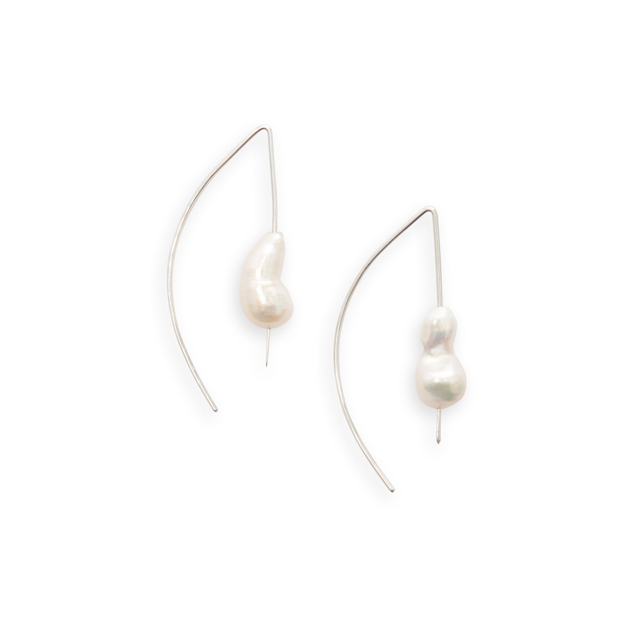 A modern threader earring with drops of Keshi pearls to add an element of classic elegance.   