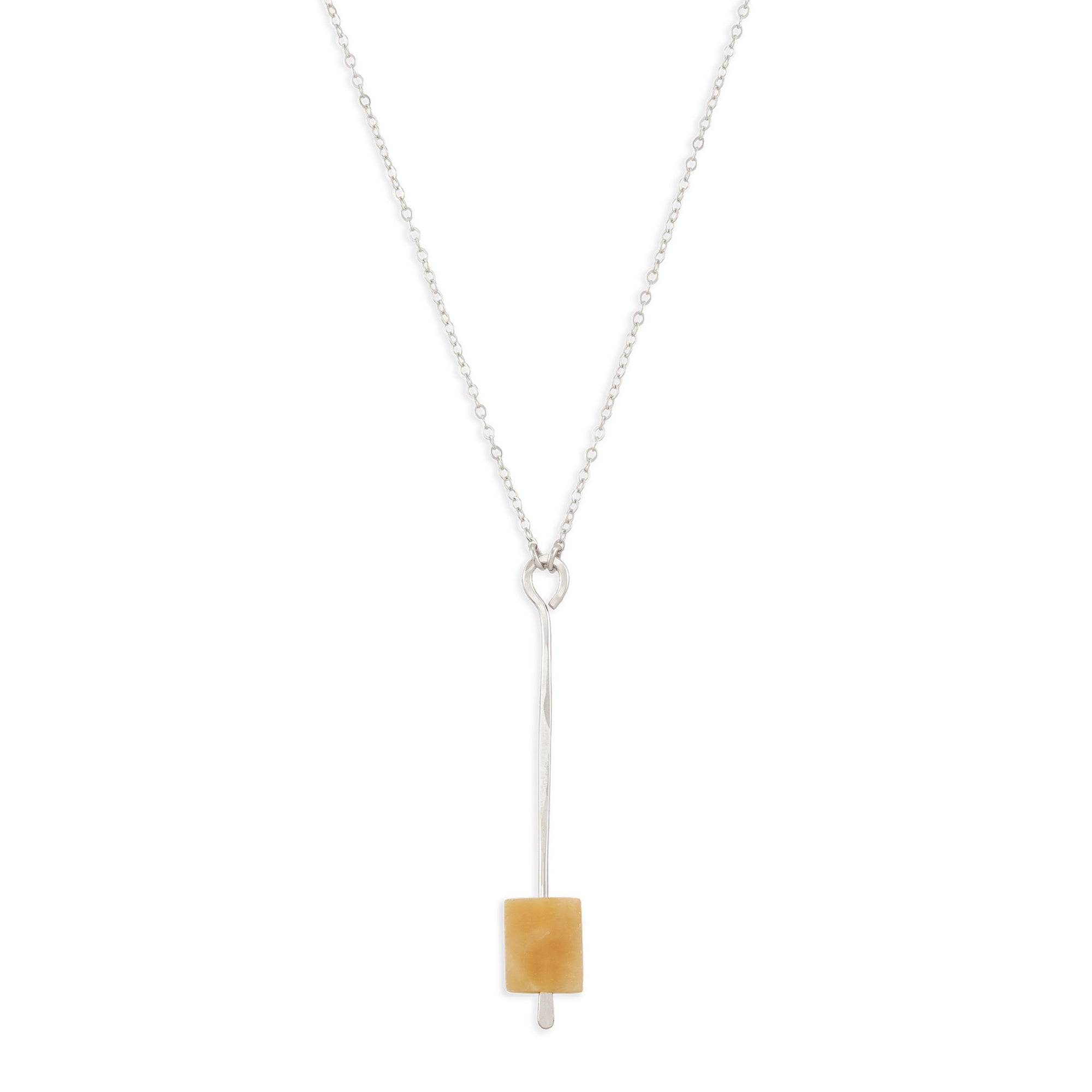 The Pendulum Necklace features frosted onyx suspended from a forged pendant in either sterling silver or 14k gold fill.
